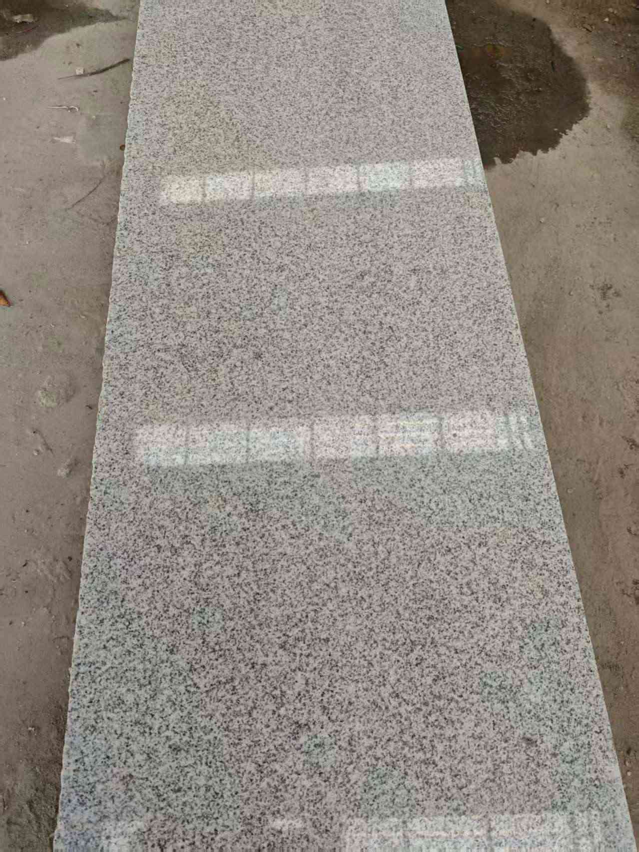 厦门芝麻白光面毛板